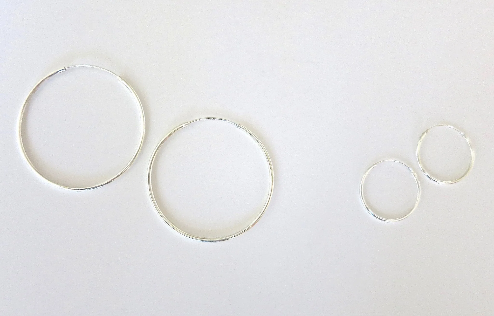 Big and small silver hoops