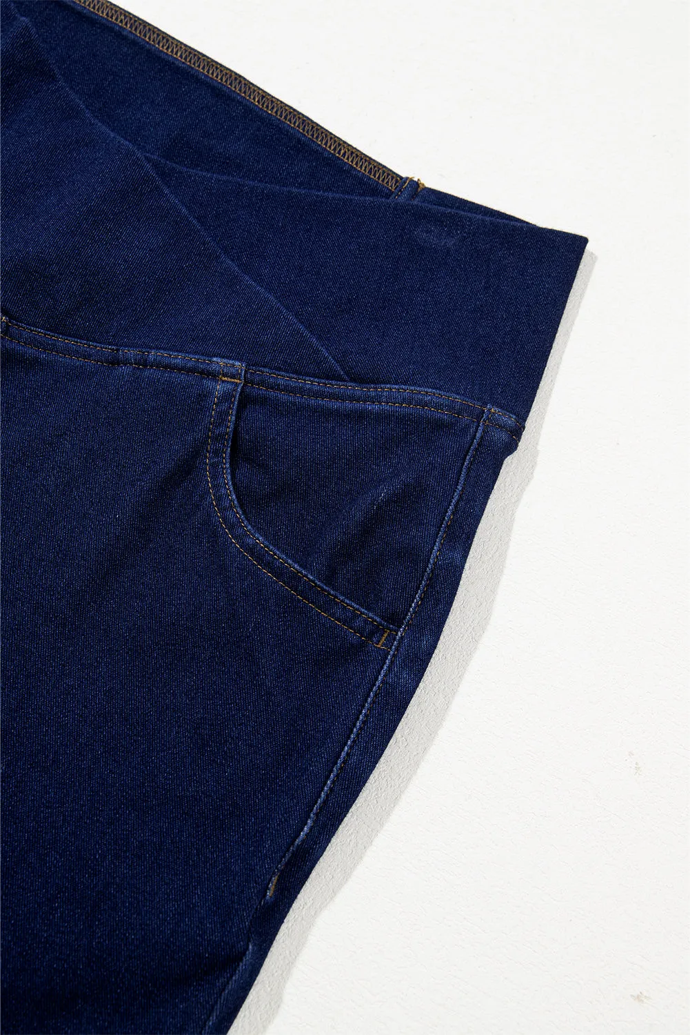 Dusk Blue Solid Crossed Waist High Elastic Fit Flare Knit Jeans
