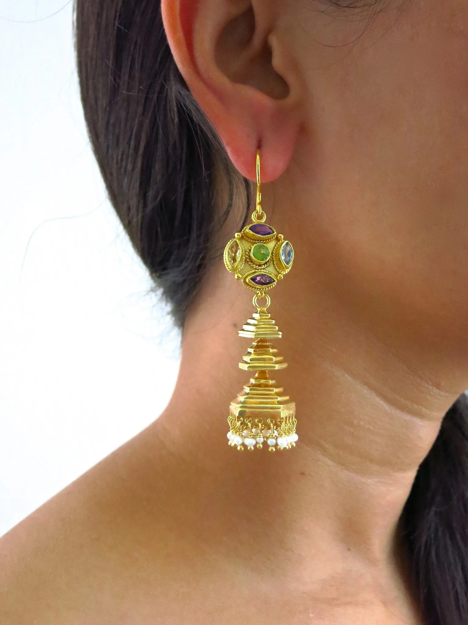 Modern, gold-plated, detachable, tiered jhumkas with multi-color gemstone tops